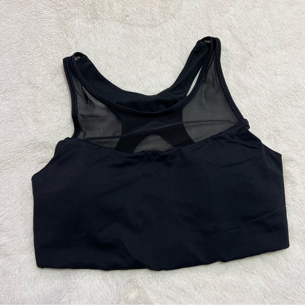 Black high neck Lululemon sports bra